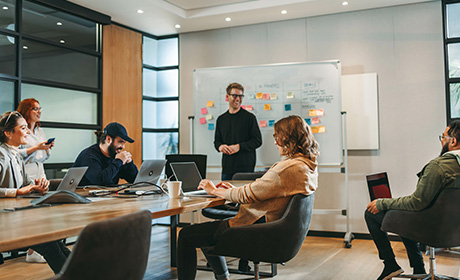 Cocoon Technology consultants in a long-term client partnership meeting